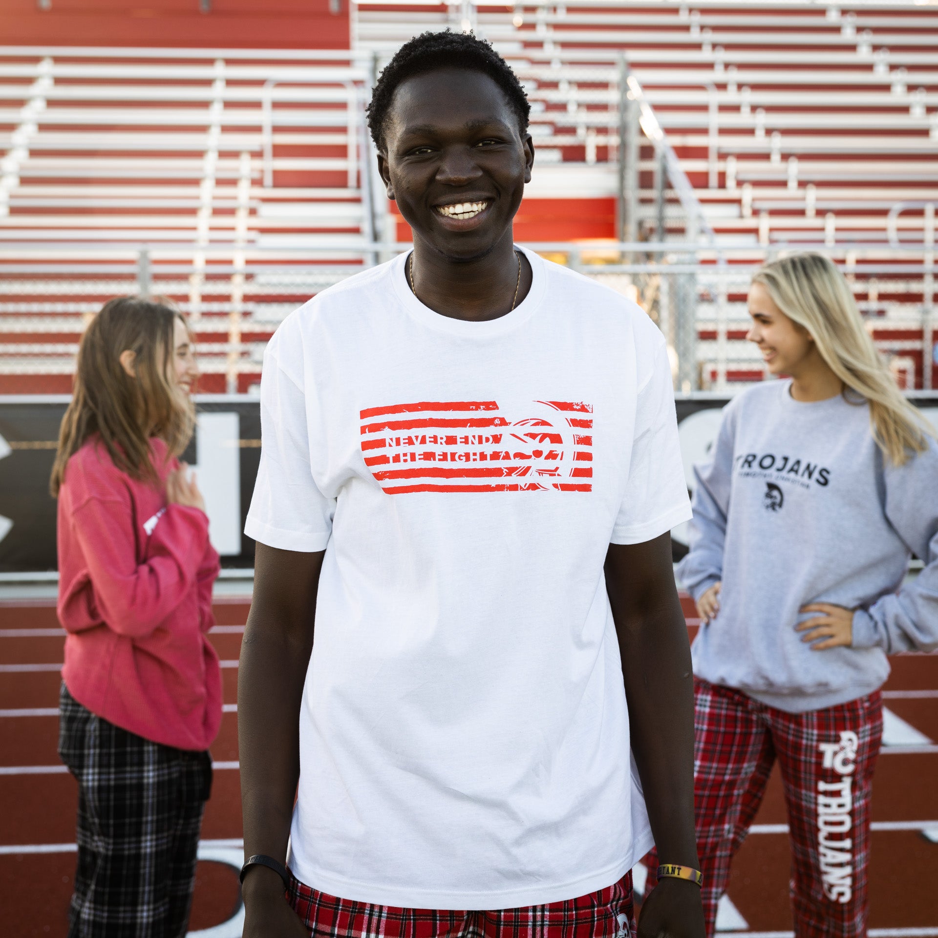 Never End The Fight T-Shirt (White or Red)