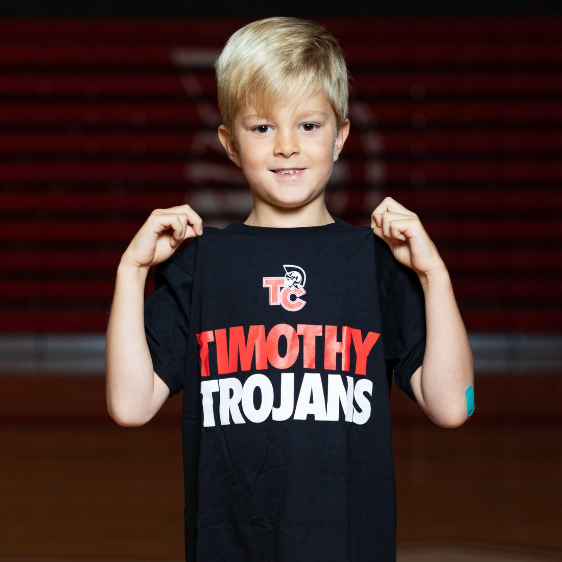 Youth Timothy Trojans T-Shirt (Black or Red)